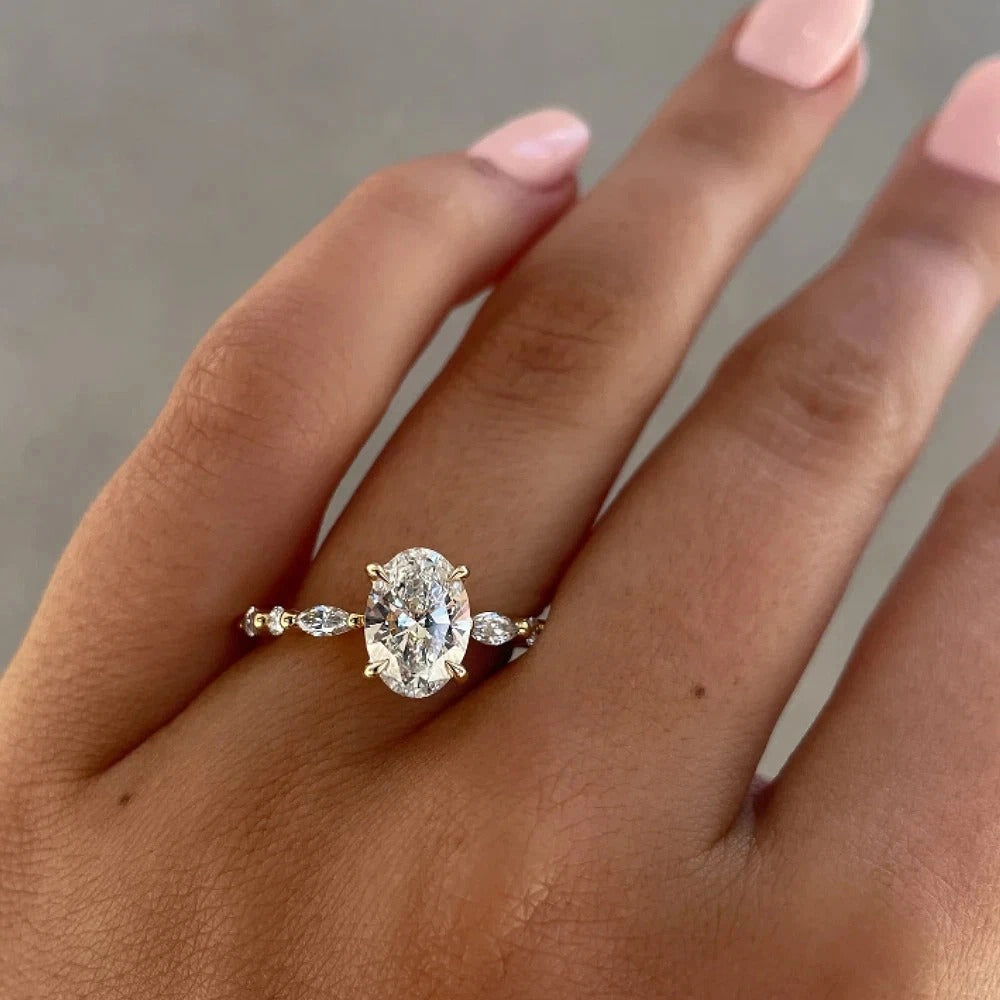 Oval-Cut Natural Diamond Ring — Four-Prong Setting with Leaf Accents