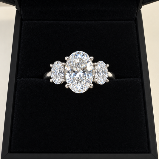 7 Ct TW Oval Natural Diamond Engagement Ring – Three-Stone Prong Setting