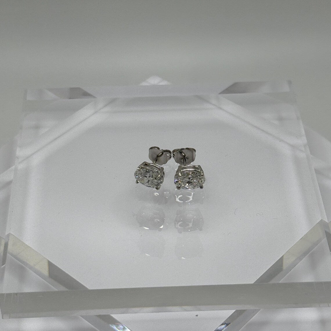2 Ct TW Oval Natural Diamond Stud Earrings – Four-Prong Basket Setting