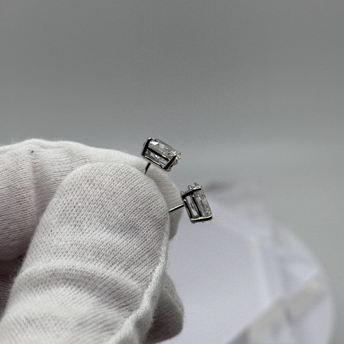 2 Ct TW Oval Natural Diamond Stud Earrings – Four-Prong Basket Setting