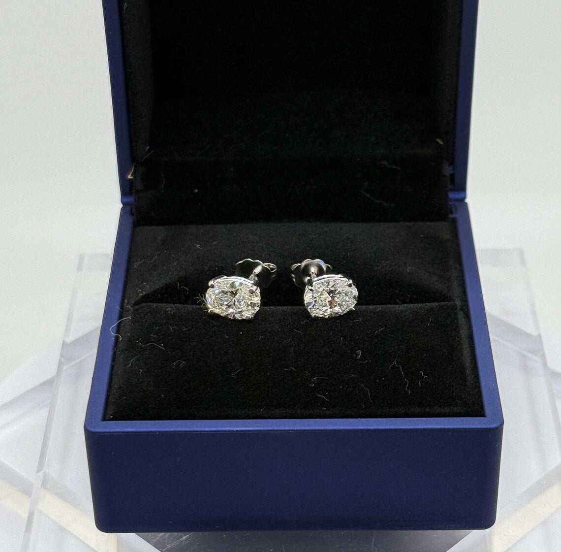 2 Ct TW Oval Natural Diamond Stud Earrings – Four-Prong Basket Setting