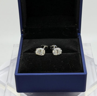 2 Ct TW Oval Natural Diamond Stud Earrings – Four-Prong Basket Setting