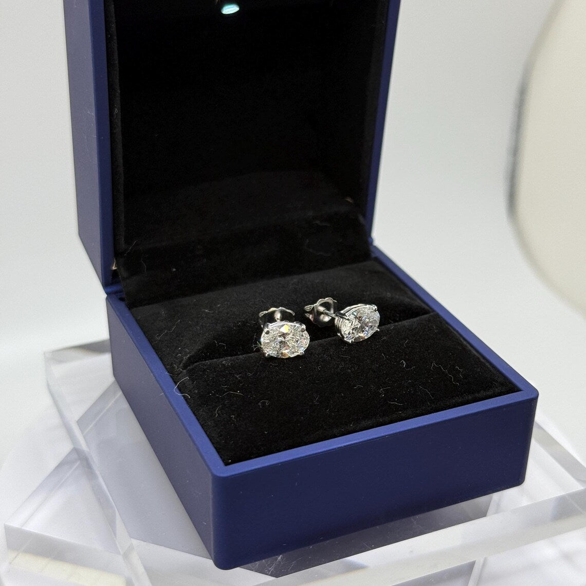 2 Ct TW Oval Natural Diamond Stud Earrings – Four-Prong Basket Setting