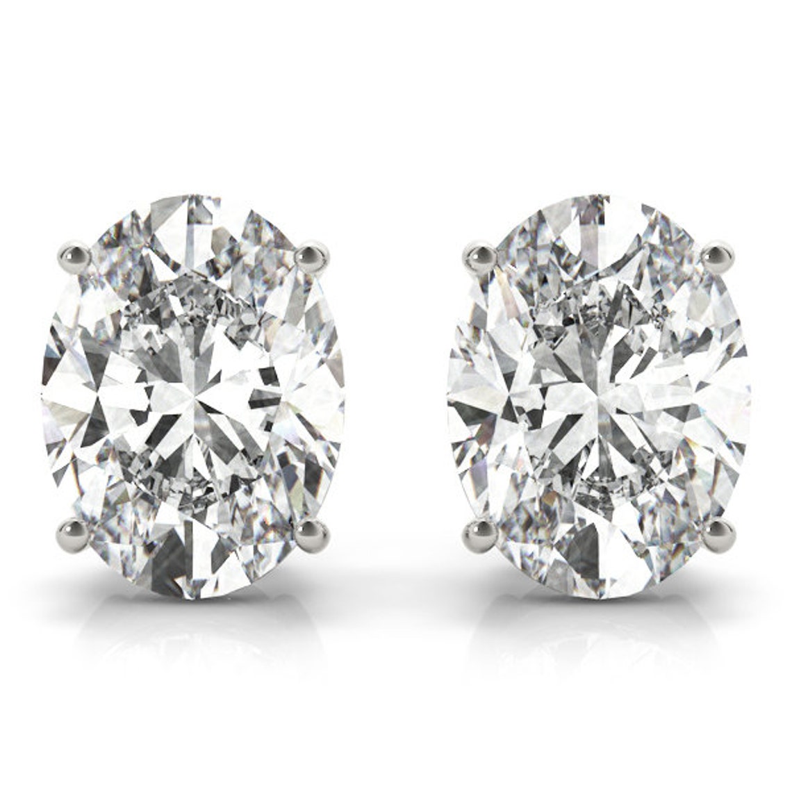 2 Ct TW Oval Natural Diamond Stud Earrings — Four-Prong Basket Setting