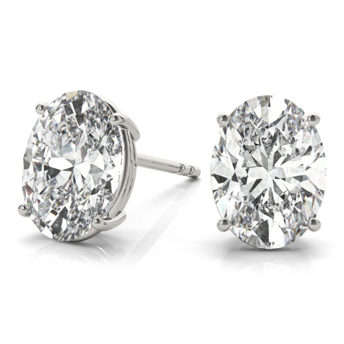 2 Ct TW Oval Natural Diamond Stud Earrings — Four-Prong Basket Setting