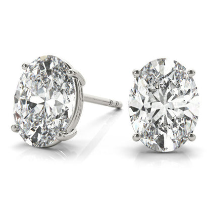 2 Ct TW Oval Natural Diamond Stud Earrings — Four-Prong Basket Setting