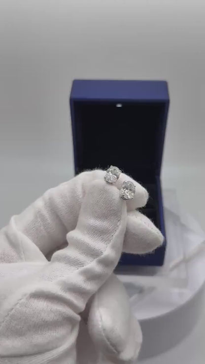 2 Ct TW Oval Natural Diamond Stud Earrings – Four-Prong Basket Setting